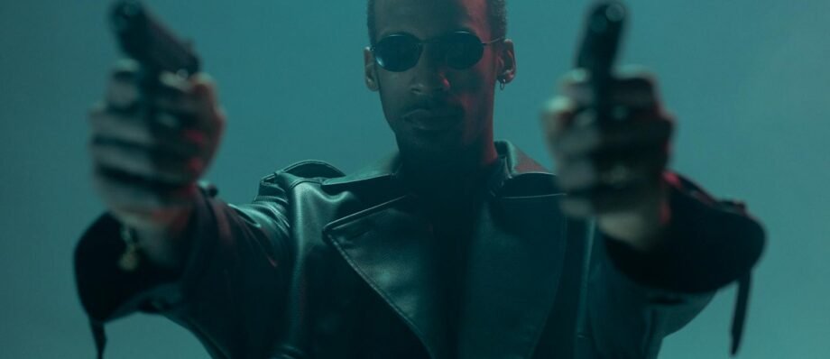Conceptual cyberpunk image featuring an individual in a leather coat holding guns, evoking a futuristic theme.